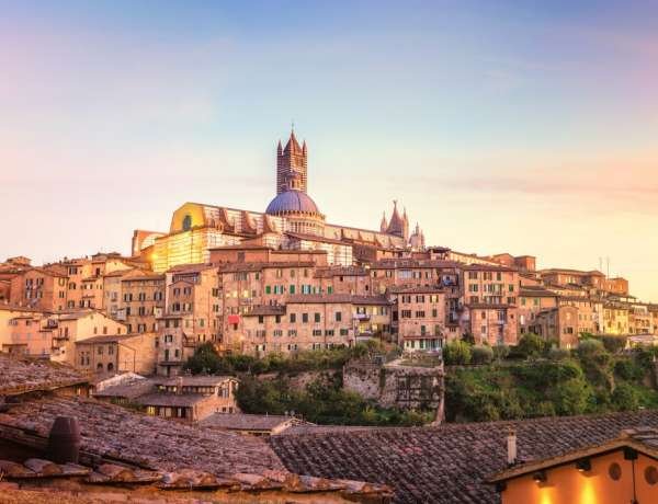 Visiter Sienne en 3 jours : vue sur la ville au coucher du soleil